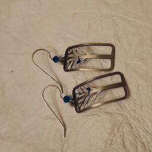 Blue bird in tree earrings